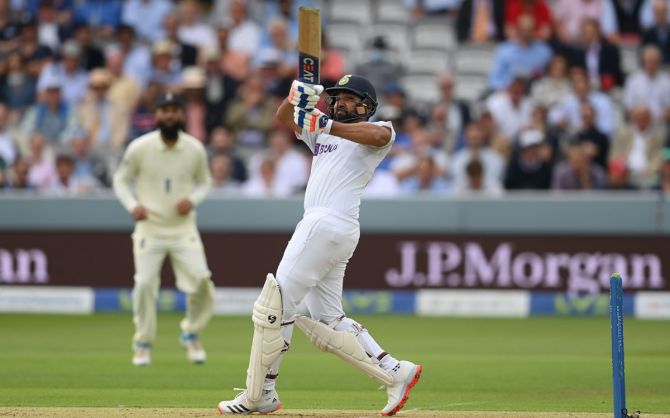 India opener Rohit Sharma hooks a delivery from England pacer Mark Wood for six on Day 1 of the second Test, at Lord's Cricket Ground, in London, on Thursday. 