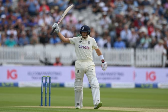 England's Joe Root celebrates after completing 50 on Day 3 of the second Test against India, at Lord's Cricket Ground, on Saturday.