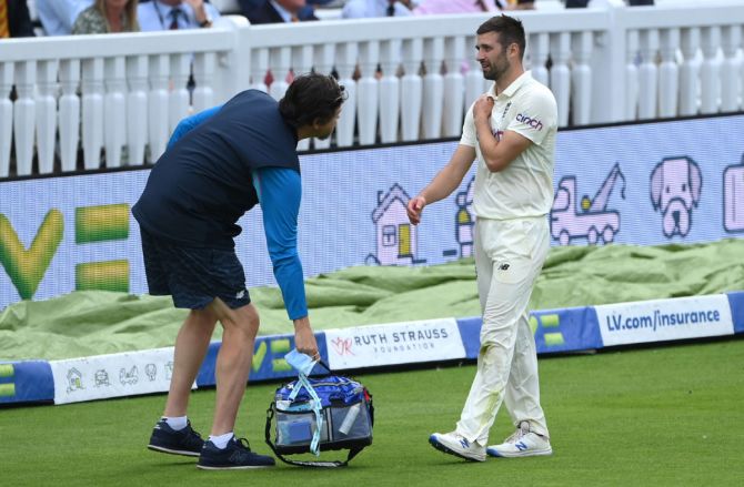 England bowler Mark Wood injures his shoulder after attempting to save a boundary during Day 4 of the second Test against India, at Lord's Cricket Ground, on August 15.
