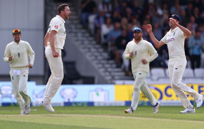 England pacer Ollie Robinson celebrates taking the wicket of India's Rishabh Pant during Day 1 of the third Test, at Emerald Headingley stadium in Leeds, England, on Wednesday.