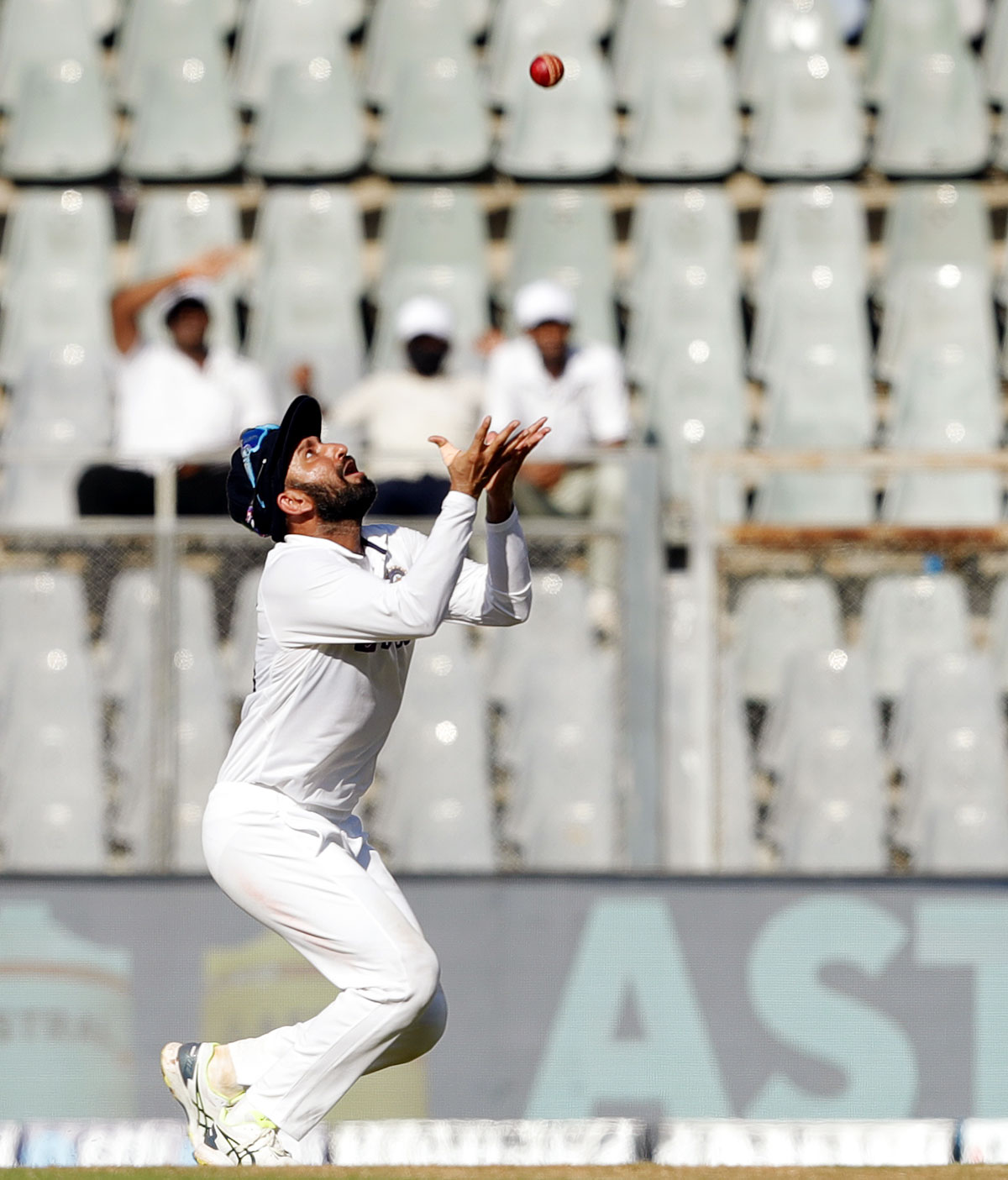 Cheteshwar Pujara takes the catch to dismiss Ross Taylor off Ravichandran Ashwin's bowling.