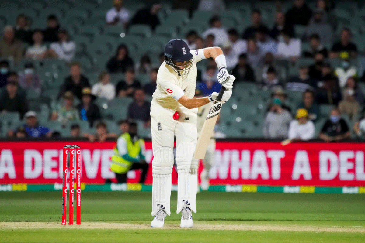 Joe Root is hit in his tender area by a Mitchell Starc delivery