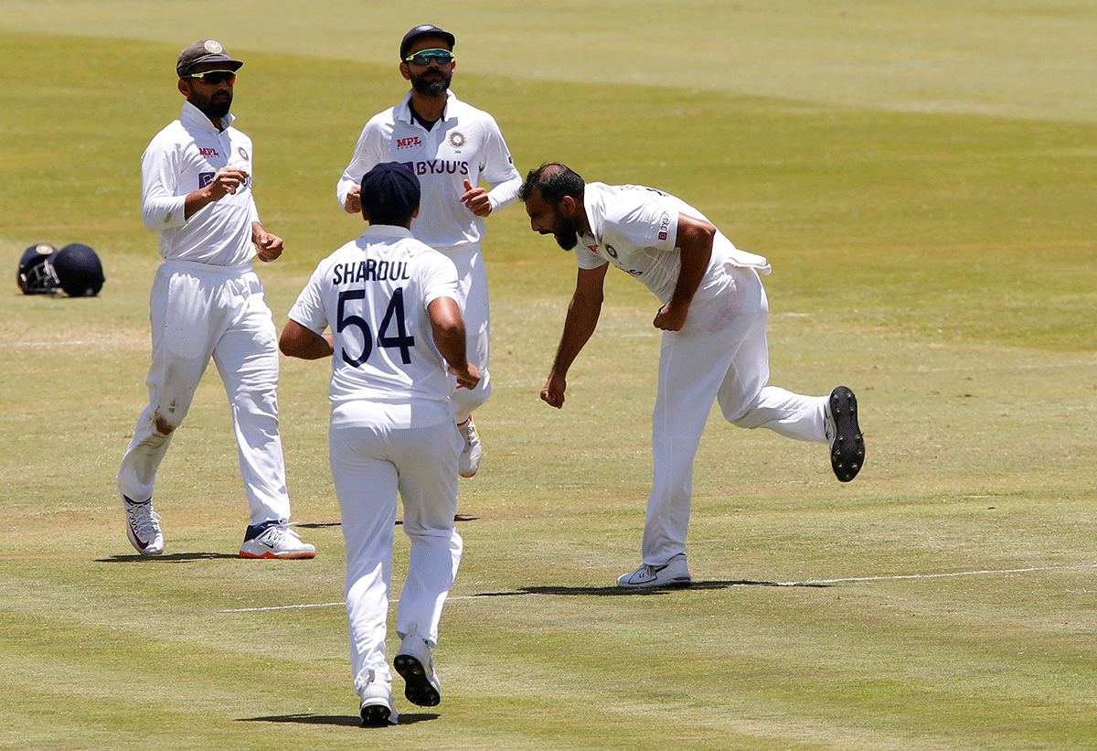 India's Mohammed Shami celebrates after taking the wicket of South Africa's Marco Jansen 