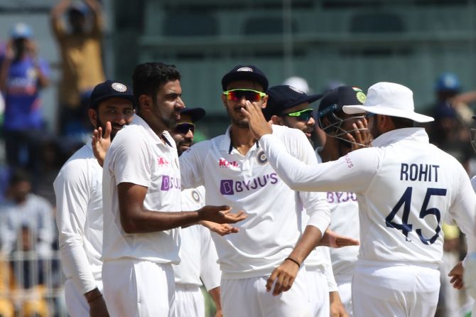 Ravichandran Ashwin is congratulated by his India teammates after dismissing Ben Stokes.