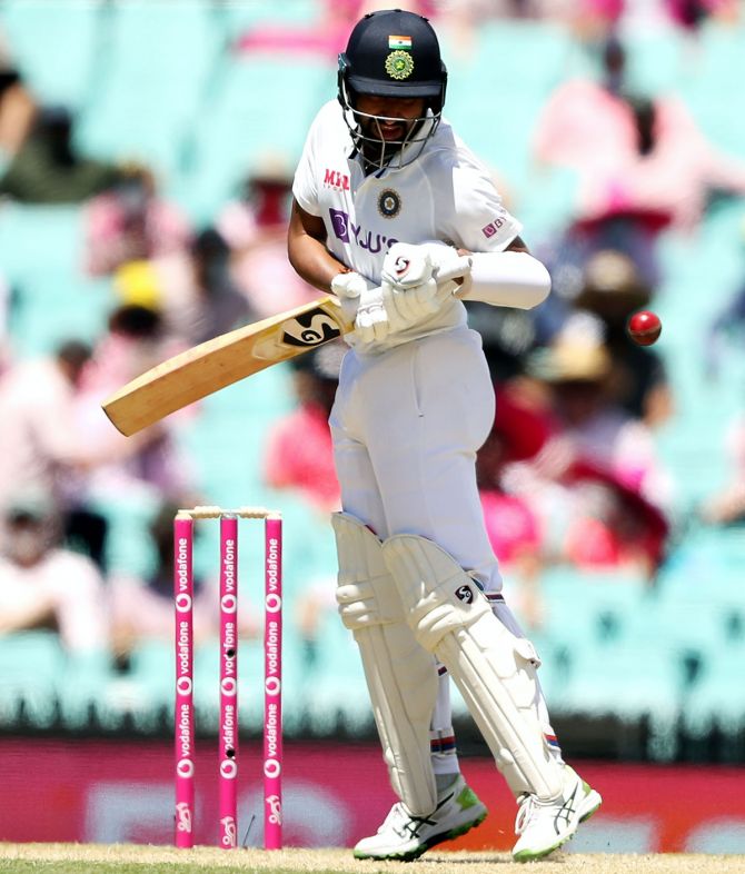 India's Cheteshwar Pujara bats during Day 3 of the third Test against Australia at the Sydney Cricket Ground on Saturday. 