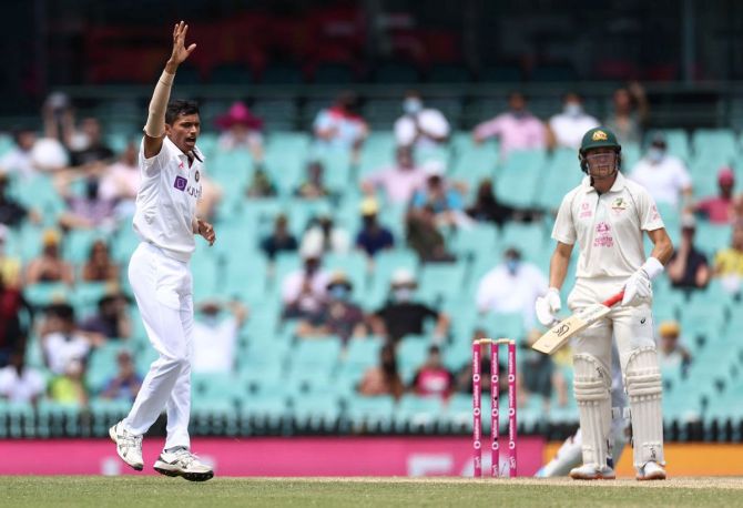 India pacer Navdeep Saini appeals successfully for caught behind against Australia's Marnus Labuschagne during Day 4 of the third Test, at the Sydney Cricket Ground, on Sunday.