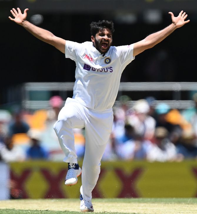 India pacer Shardul Thakur celebrates after dismissing Tim Paine during Day 2 of the fourth Test against Australia at the Gabba, on Saturday.