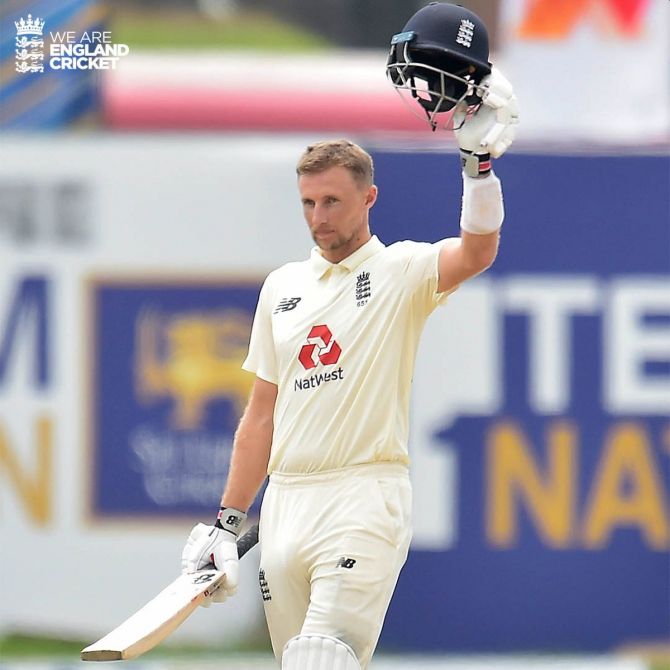 England's Joe Root celebrates on completing his century in the 2nd Test against Sri Lanka in Galle on Sunday