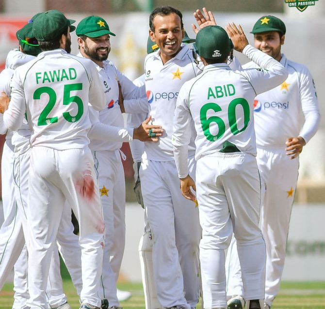 Pakistan's left-arm spinner Nauman Ali celebrates a wicket on Day 4 of the 1st Test in Karachi on Friday 