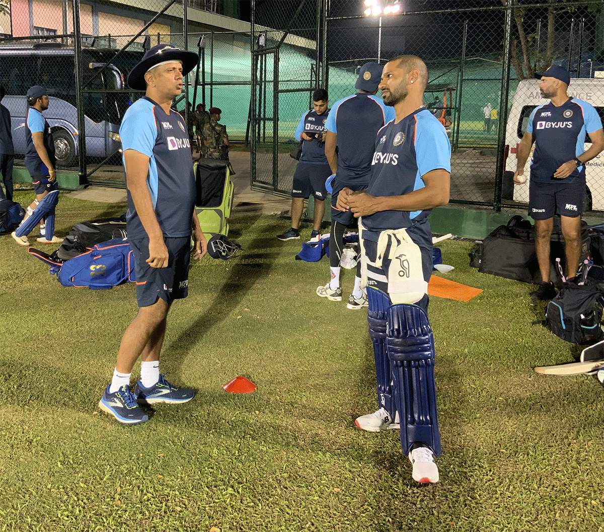 India coach Rahul Dravid and skipper Shikhar Dhawan chat during a practice session on Saturday. Like coach Dravid had mentioned earlier, skipper Dhawan also said that there is no hard and fast rule that they have to try out each and every player in this series against Sri Lanka.