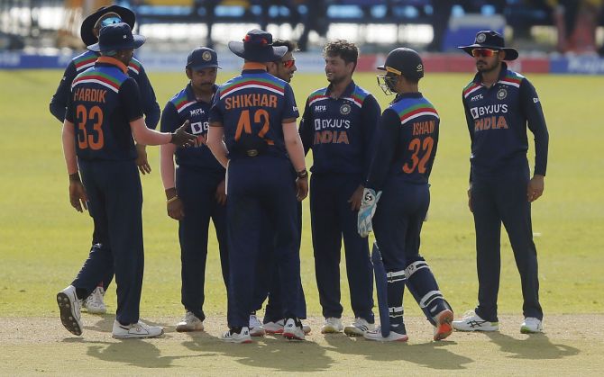 Kuldeep Yadav celebrates with teammates after taking the wicket of Sri Lanka's Minod Bhanuka 