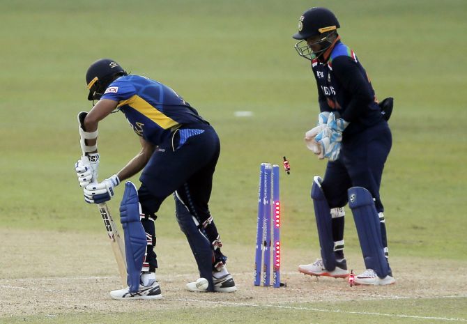 Sri Lanka's Dasun Shanaka is bowled by Yuzvendra Chahal.