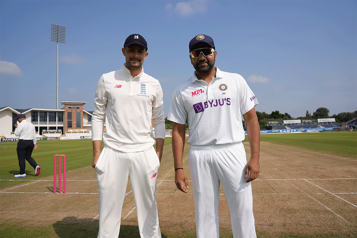 County Select XI captain Will Rhodes and India captain Rohit Sharma at the toss on Tuesday