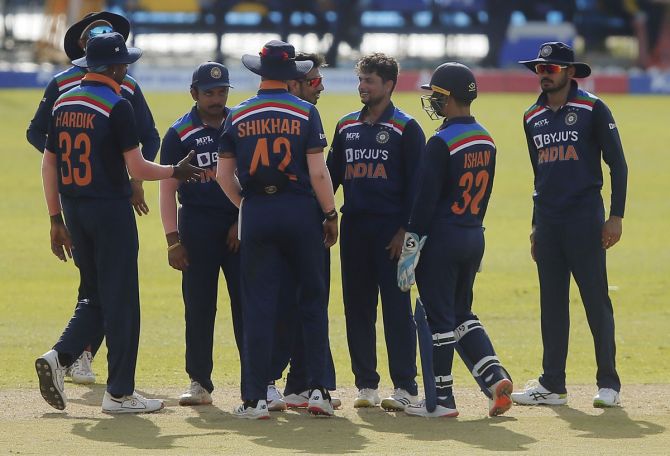 India's players celebrate after the fall of a wicket in the third ODI against Sri Lanka