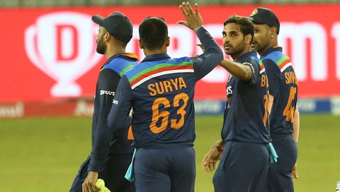 India's players celebrate the wicket of Chamika Karunaratne