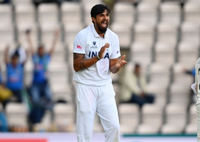  Ishant Sharma celebrates taking the wicket of Devon Conway
