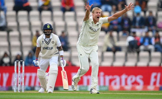 New Zealand pacer Kyle Jamieson appeals successfully for the wicket of India's Virat Kohli.