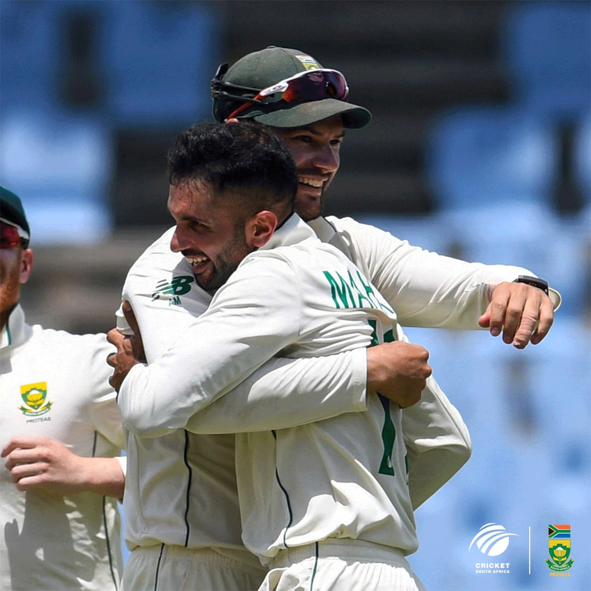 South Africa's Keshav Maharaj hugs captain Dean Elgar after taking a hat-trick. Maharaj picked the 7th Test fifer of his career as he took the Proteas to victory over the West Indies on Monday