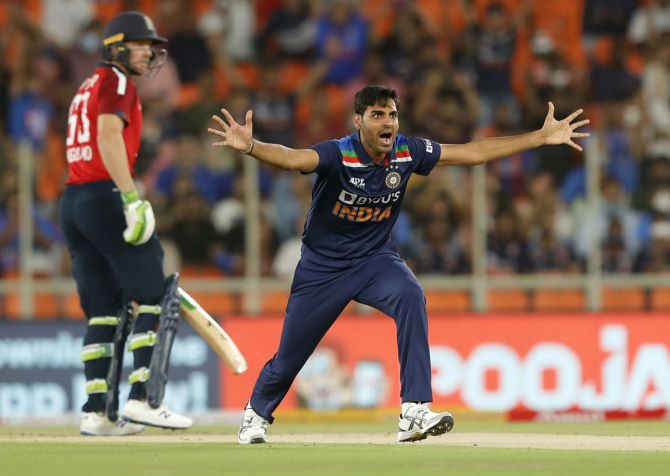 Bhuvneshwar Kumar successfully appeals for the wicket of Jos Buttler