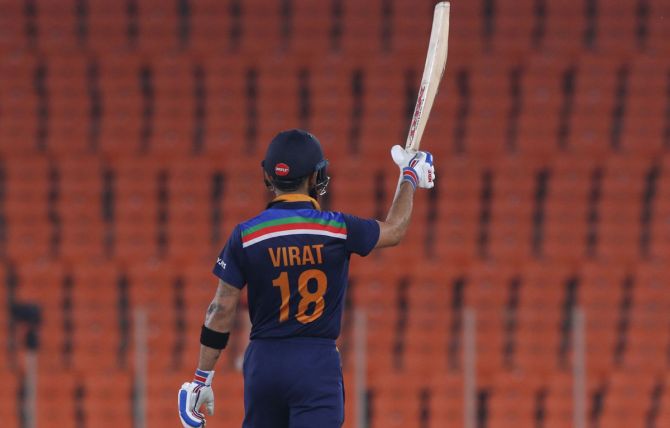 Virat Kohli celebrates after completing 50 during the fifth T20I against England