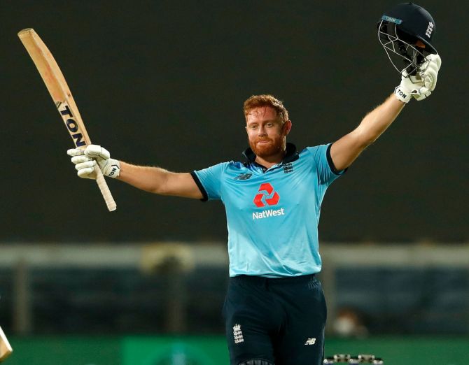 Jonny Bairstow celebrates on completing his century while chasing 337 for victory