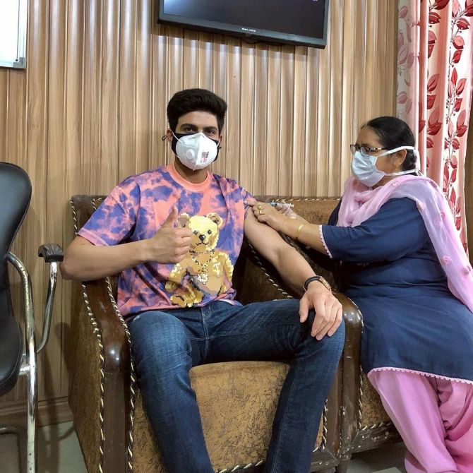 India cricketer Shubman Gill gets a jab of the COVID-19 vaccine