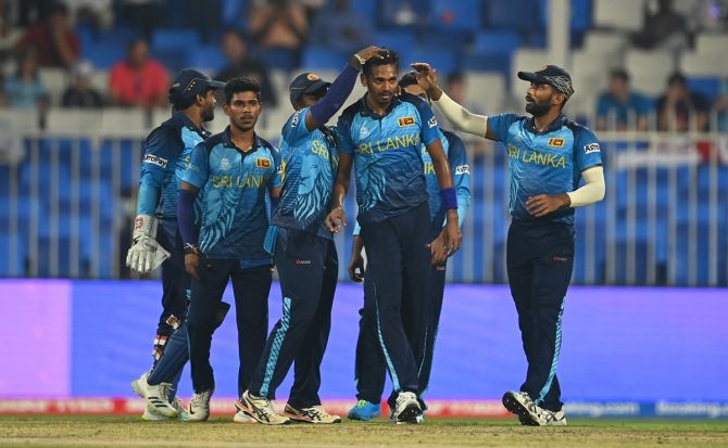 Sri Lanka pacer Dushmantha Chameera is congratulated by teammates after dismissing England opener Dawid Malan.
