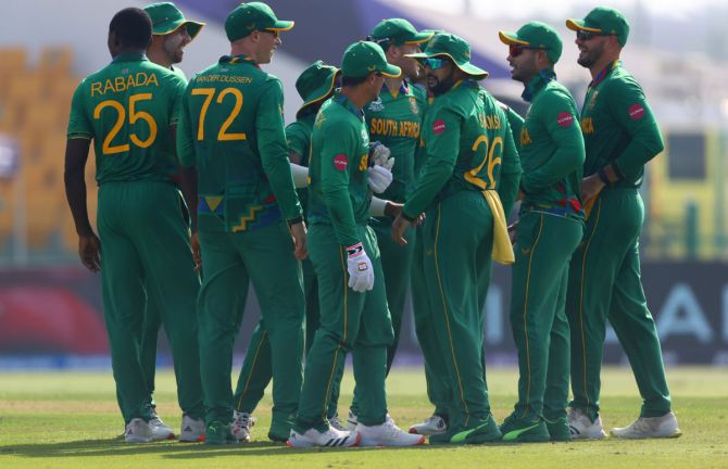 South Africa's players celebrate the wicket of Mushfiqur Rahim.