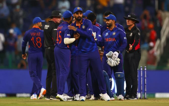 India's players celebrate after an easy victory over Afghanistan in the T20 World Cup Super 12s match, at Sheikh Zayed stadium in Abu Dhabi, on Wednesday.