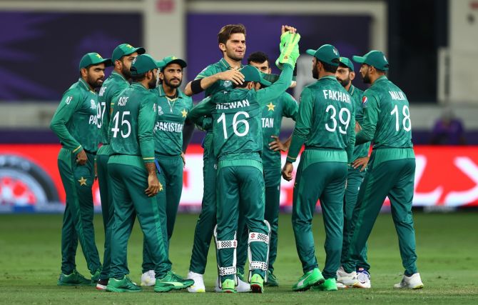 Pakistan pacer Shaheen Shah Afridi celebrates with teammates after dismissing Australia opener Aaron Finch early.