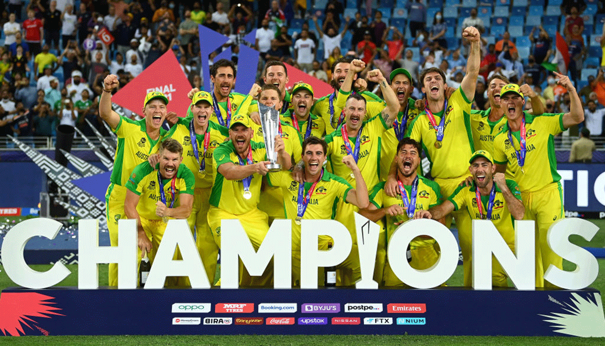 Australia's Aaron Finch lifts the ICC World T20 Trophy with teammates after the ICC Men's T20 World Cup final at Dubai International Stadium in Dubai on Sunday