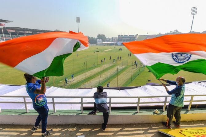 Indian fans cheer from the balcony as during Team India's practice session ahead of the first Test against New Zealand, at Green Park in Kanpur, on Wednesday.