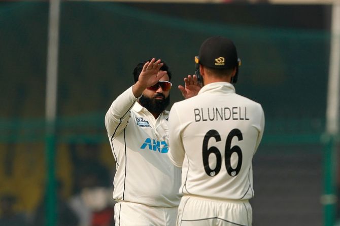 Ajaz Patel's celebrates with Tom Blundell after dismissing Ishant Sharma.