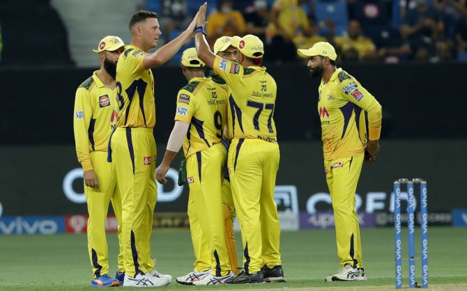 CSK's players celebrate the wicket of Shikhar Dhawan, who was caught behind of Josh Hazlewood