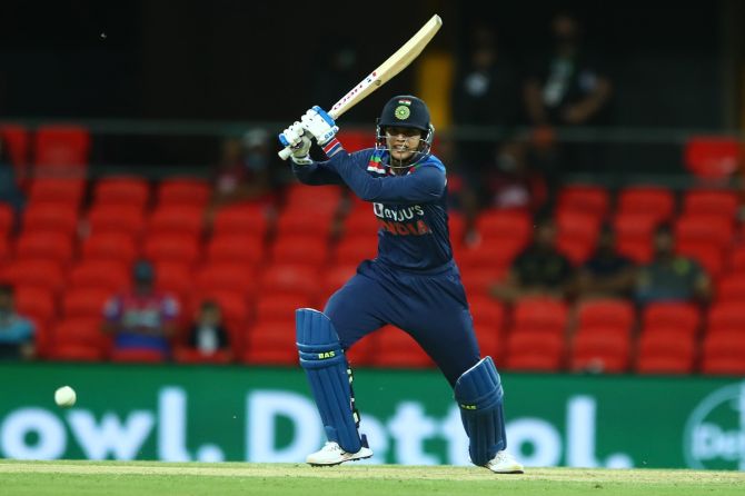 India's Smriti Mandhana bats during the third T20 International against Australia, at Metricon Stadium in Gold Coast, Australia, on Sunday.