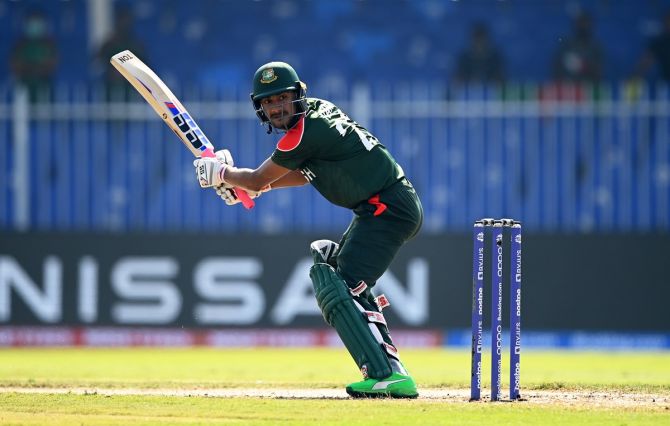 Bangladesh opener Mohammad Naim cuts the ball for a boundary during the ICC men's T20 World Cup match against Sri Lanka, in Sharjah, on Sunday.