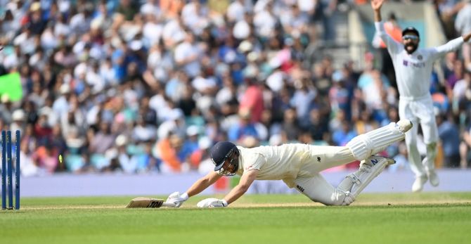 Dawid Malan makes a vain attempt to make his ground following Mayank Agarwal's throw to wicketkeeper Rishabh Pant and is run-out.