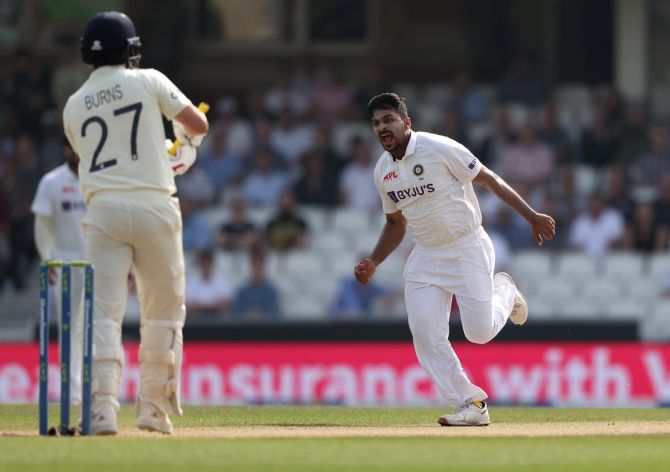 India pacer Shardul Thakur celebrates dismissing England opener Rory Burns during the morning session on Day 5 of the fourth Test, at The Kia Oval in London, on Monday.