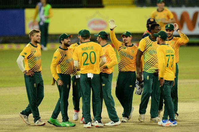 South Africa's players celebrate the dismissal of Sri Lanka's Avishka Fernando during the first T20 International, at R. Premadasa stadium in Colombo, on Friday.
