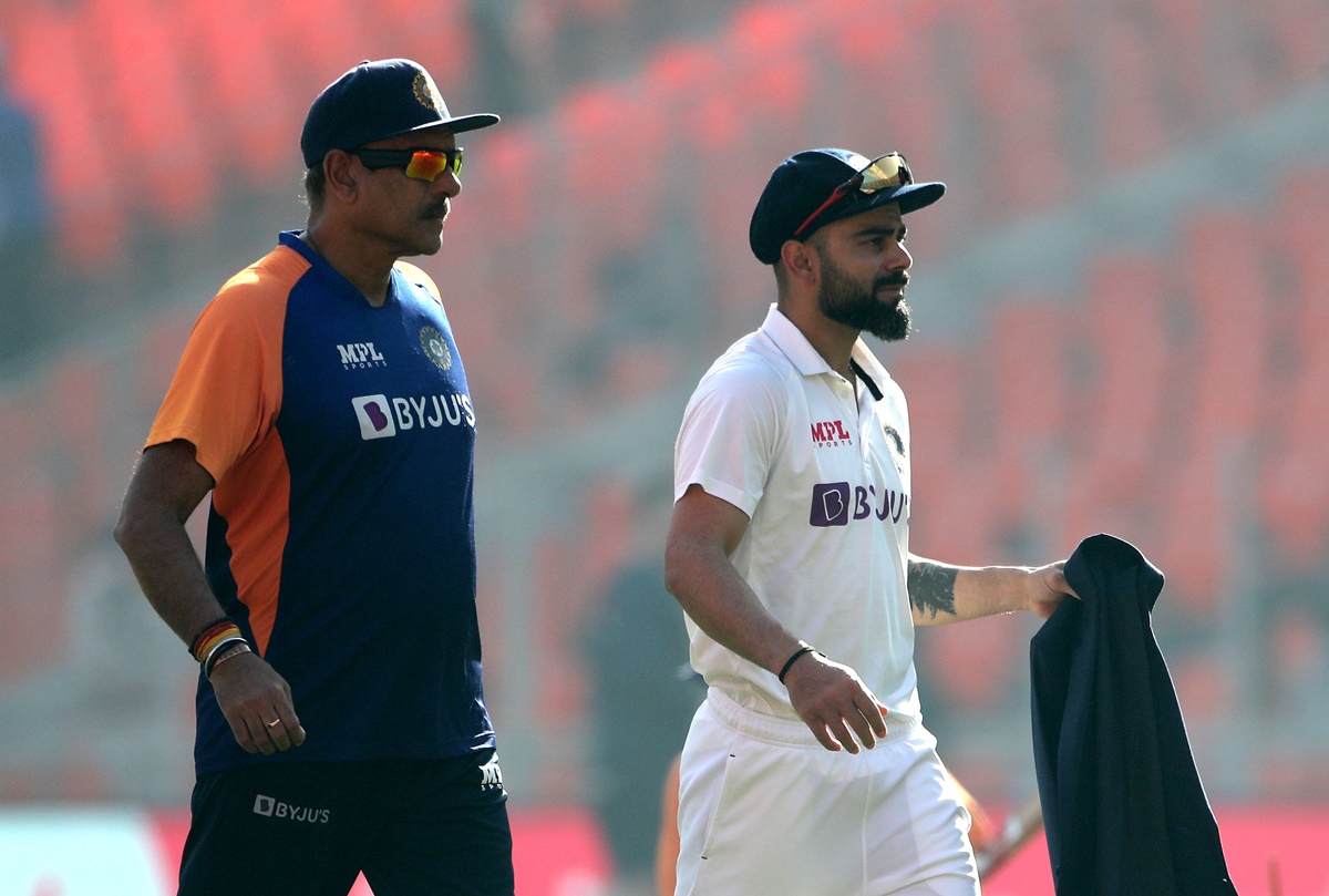 India coach Ravi Shastri, left, and captain Virat Kohli inspect the pitch prior to Day 1 of the 4th Test against England, at the Narendra Modi stadium in Ahmedabad, on March 4, 2021.
