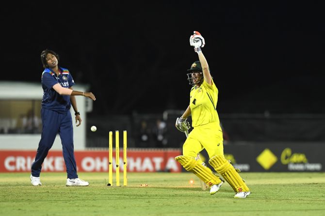 Australia opener Beth Mooney celebrates scoring the winning runs in the second women's ODI against India, at Great Barrier Reef Arena in Mackay, Australia, on Saturday.