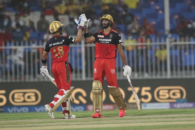 Devdutt Padikkal gets a high-five from skipper after completing 50.