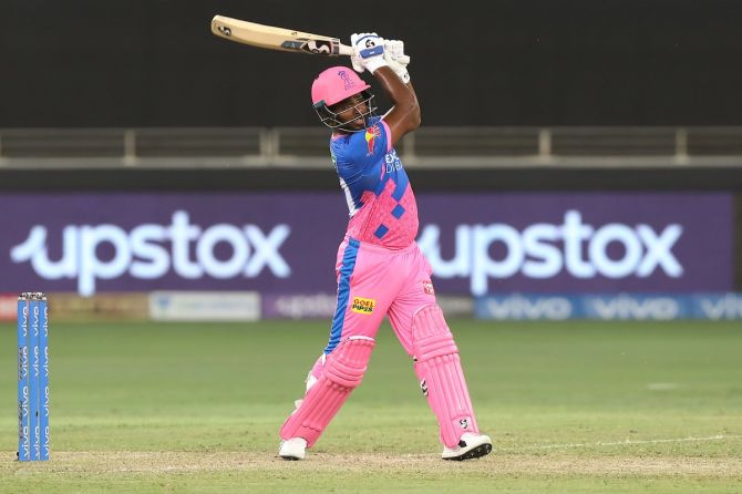 Rajasthan Royals skipper Sanju Samson hits over the top for six during the Indian Premier League match against Sunrisers Hyderabad, in Dubai, on Monday.
