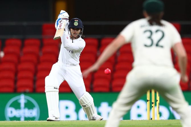 India's Smriti Mandhana bats during Day 1 of the one-off day/night  women's Test against Australia, at Metricon Stadium in Gold Coast, Australia, on Thursday.