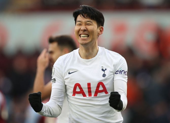Son Heung-min celebrates scoring Tottenham Hotspur's fourth goal to complete his hat-trick against Aston Villa, at Villa Park, Birmingham.