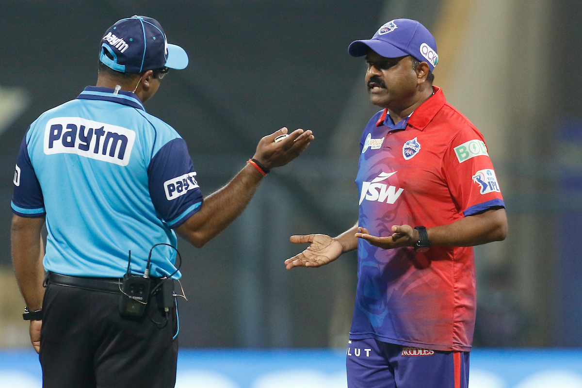 Delhi Capitals assistant coach Pravin Amre remonstrates with the umpire during the IPL match against Rajasthan Royals, at the Wankhede Stadium in Mumbai on Friday.
