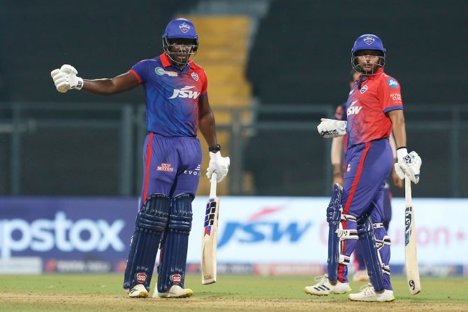 Delhi Capitals batters Rovman Powell and Kuldeep Yadav react after Rajasthan Royals bowler Obed McCoy sends down a full toss off the third delivery of the last over in the IPL match at the Wankhede Stadium, in Mumbai on Friday