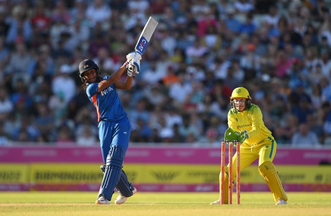 Harmanpreet Kaur, who top-scored for India in Sunday's final with 65 off 43 balls, including  7 fours and 2 sixes, sends the ball to the boundary.