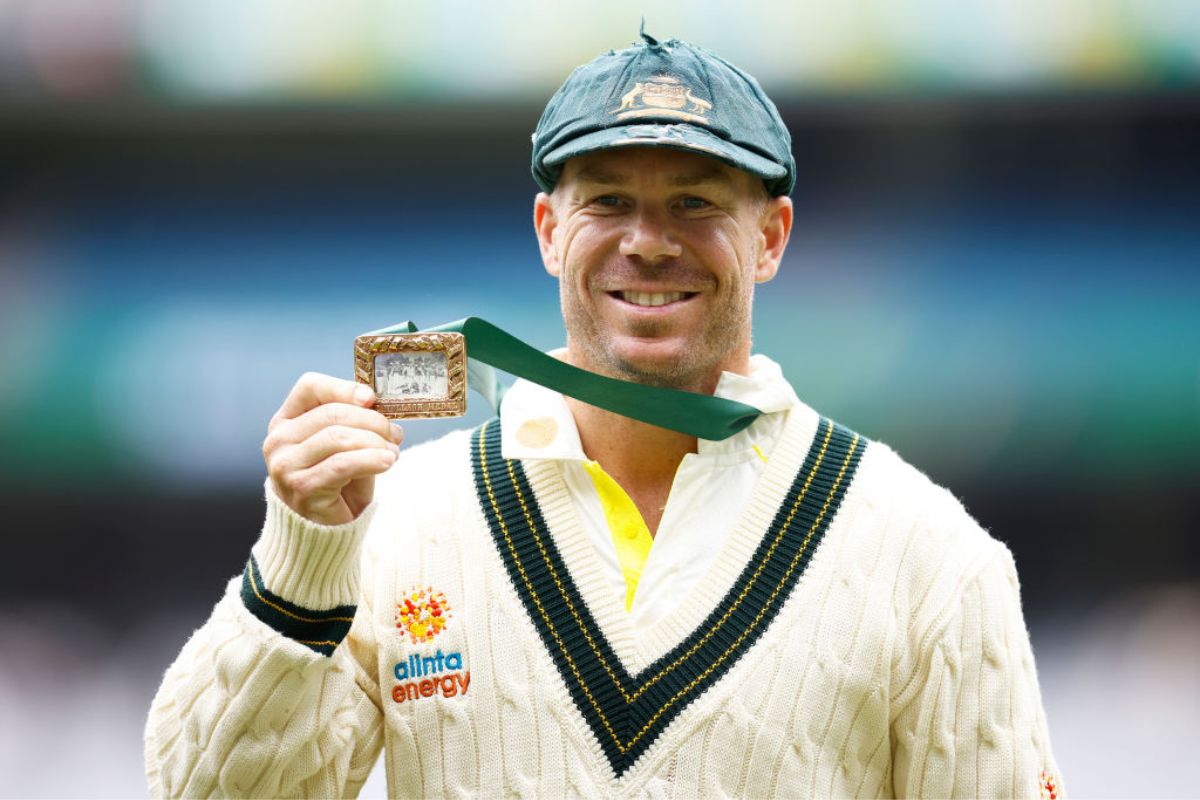 David Warner of Australia holds the Mullagh Medal after being awarded player of the match