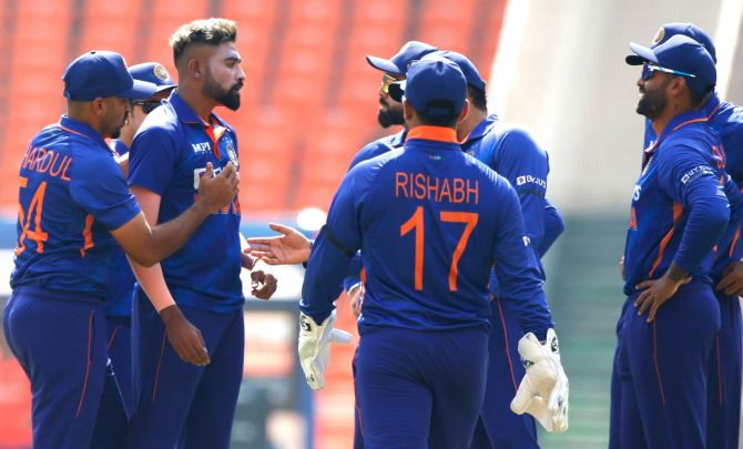 India's players celebrate after Mohammed Siraj dismisses West Indies opener Shai Hope during the first One-Day International, in Ahmedabad, on Sunday.